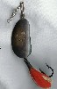 Old fishing lure made by John H Mann, the Kidney Spoon